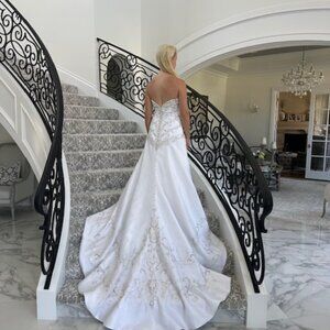 Gorgeous white/silver a-line, strapless wedding dress.
